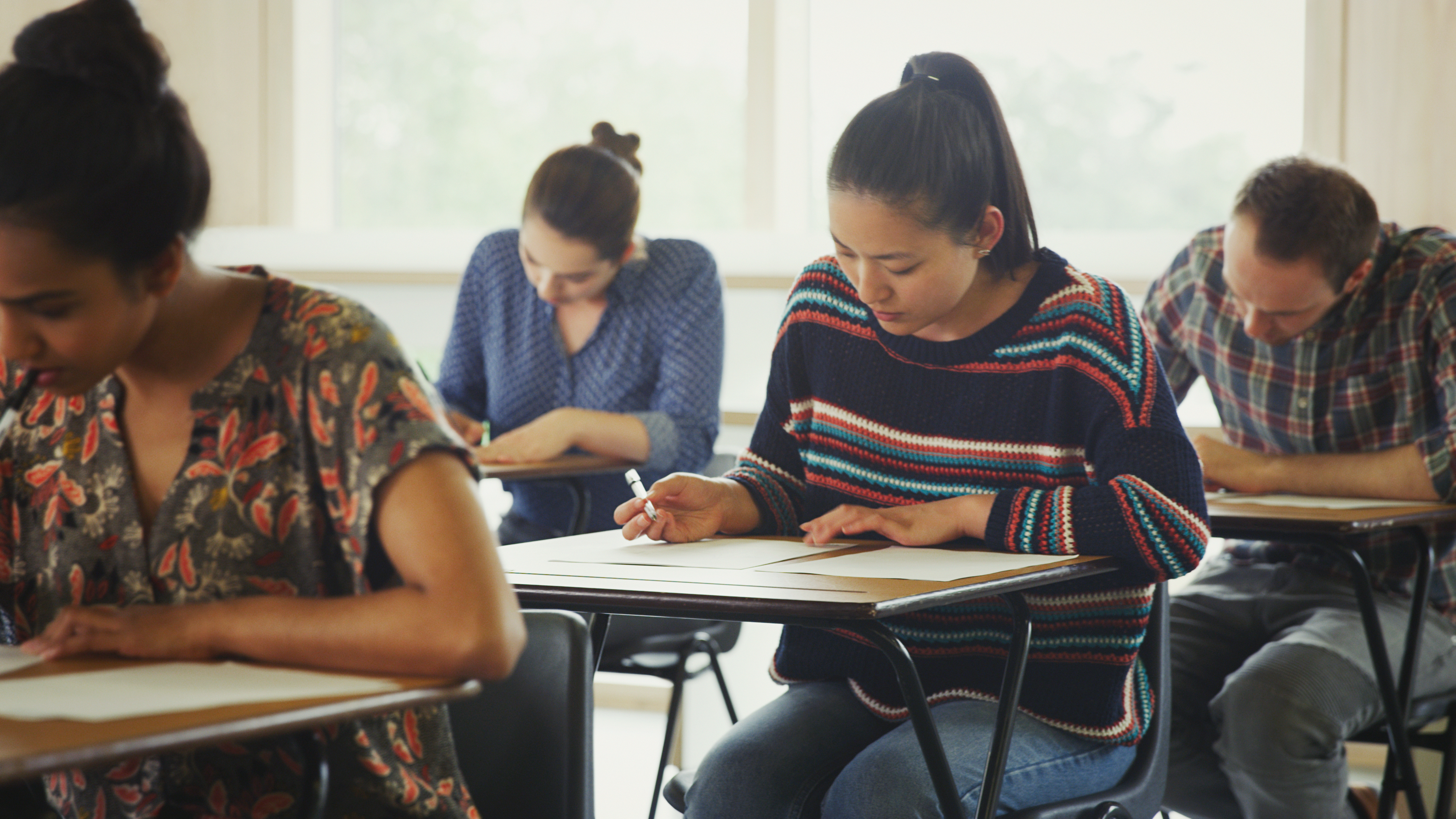 Candidats prenant part à une session d'examen